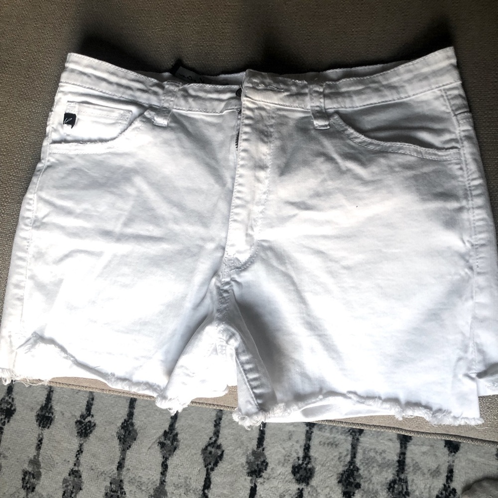 Kancan Los Angelo’s white fringe shorts